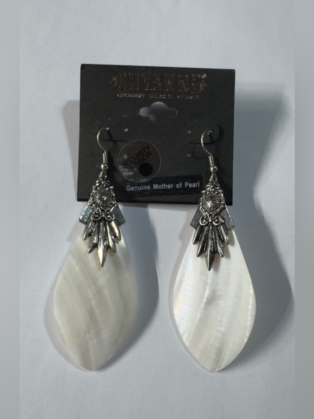 Shyanne Iridescent White Mother of Pearl Teardrop Earrings with Silver Accents